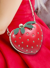 An amazing eye-catching fashion piece! Fall in love with this deliciously cute crossbody bag featuring a heart-shaped design that's perfect for kawaii fashion lovers! This charming accessory combines luxury and whimsy with its golden strawberry ball details and playful faux fur leaf accent.